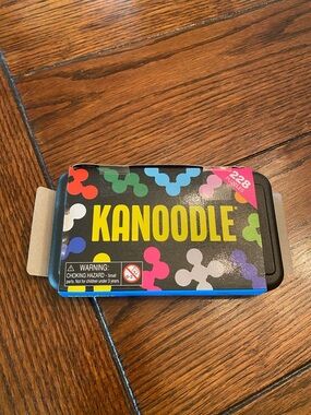 Kanoodle Puzzle Game Tin - Multicolor